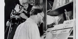 black-and-white image of late filmmaker Robert Flaherty filming late RISD professor John Howard Benson