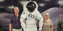 Lye and Andreozzi pose with co-designed space suit