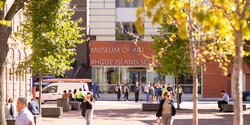 students hurrying to class through Market Square