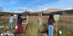 students paint outside in mexico