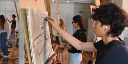Pre-College students drawing at easels