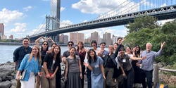 a group smiles in new york for a photo