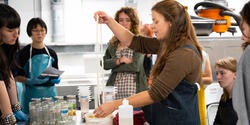 Meagan Phipps with Textiles students in the dye lab