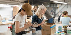 grad students at work in the ceramics studio