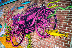 Old fashioned car portion of Keri King 05 IL's mural—What's in the River?—in the Olneyville section of Providence