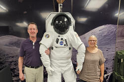 Lye and Andreozzi pose with co-designed space suit