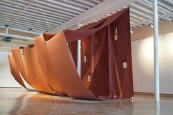 a tent-like structure built out of paper