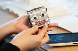 a robot head with moveable face elements