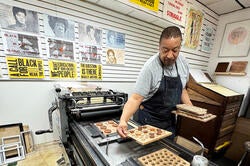 printmaker Jacques Bidon at work in his shop