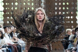 model at Collection 2026 wearing neckpiece made of tree branches