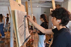 Pre-College students drawing at easels