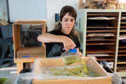a student makes paper