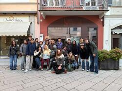 Students stand outside in italy