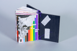 a book with rainbow stripes