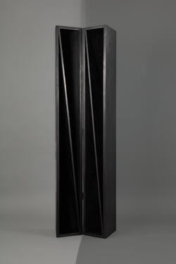 an open, tall black bifold cabinet