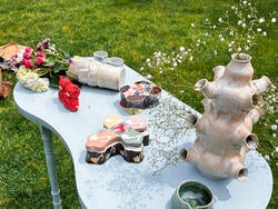 ceramic art pieces on a table