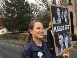 designer Georgie Stout at a protest