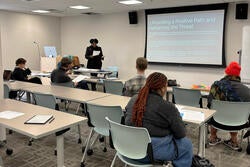 Tyanna Buie leads a Teaching & Learning Lab workshop focused on inclusive critique