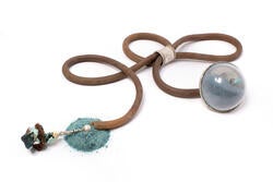 detailed view of bolo featuring rubber tubing