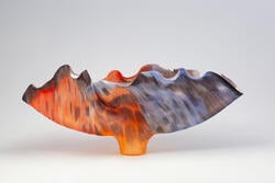 glass vessel by Toots Zynsky with coloring of American Kestrel
