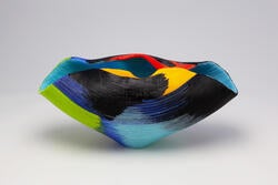 glass vessel by Toots Zynsky with coloring of Chilean Tanager