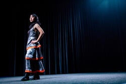 A student model on-stage in the RISD Auditorium