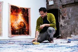 Baris Gokturk working on an installation