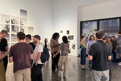 visitors check out work by new RISD Photography MFAs on opening night
