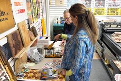 Participating art teachers at work in the print shop of Jacques Bidon