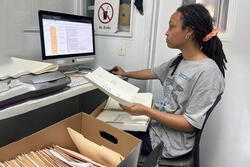 Summer intern Frances Kadushin at work on her computer