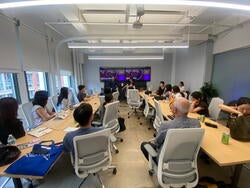 a group of students visit alumni in new york