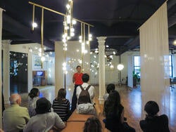 a group listens to a speaker in astudio