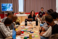 participants gather at RISD's Long Table