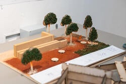 a model of an outdoor camping-themed play space