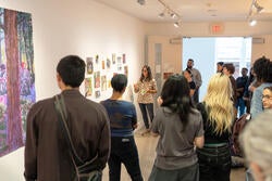 Mala Iqbal discusses her work with students in the gallery