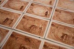 a selection of sepia-toned prints