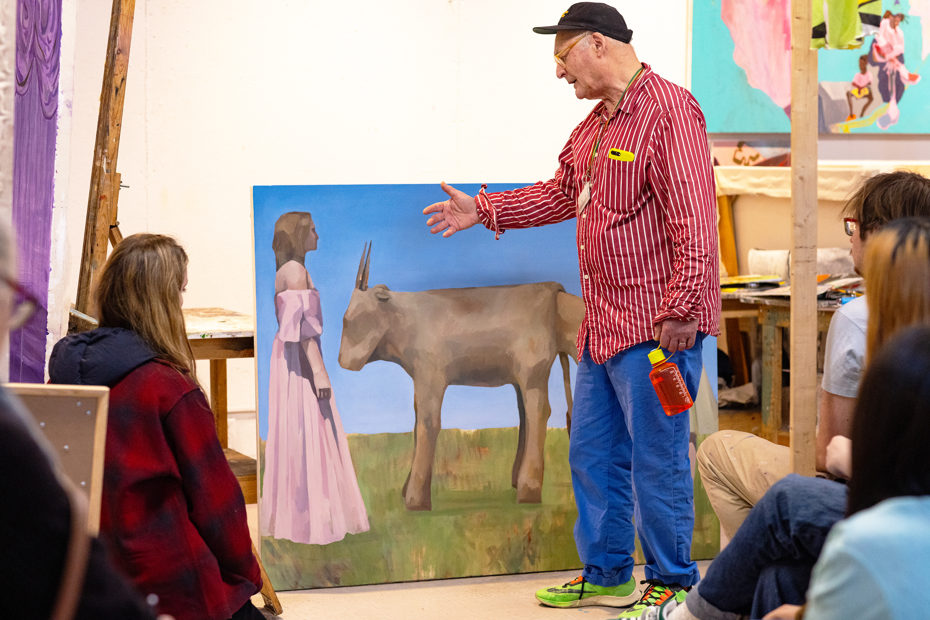 Professor Dennis Congdon discusses a quirky painting of two people and a cow