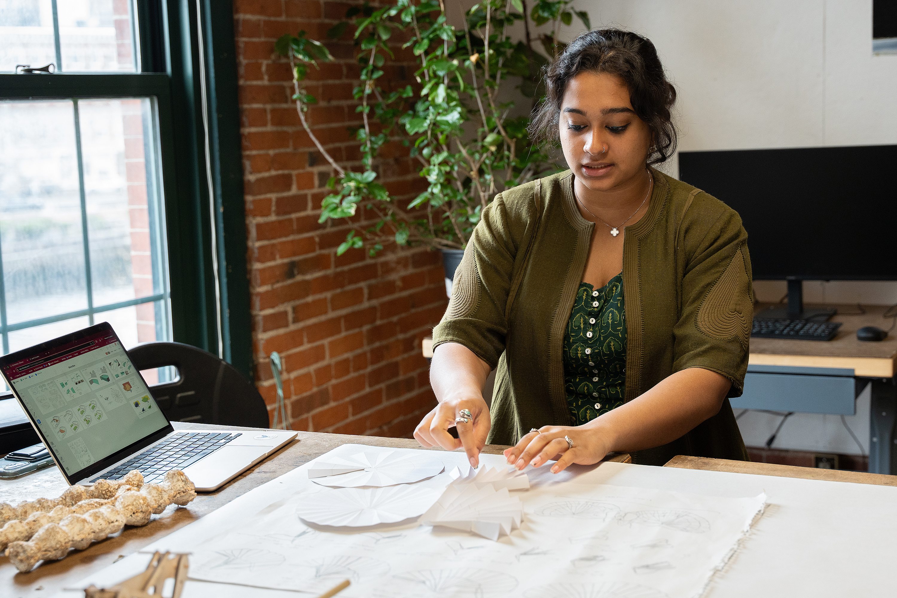 Karu is working with origami forms