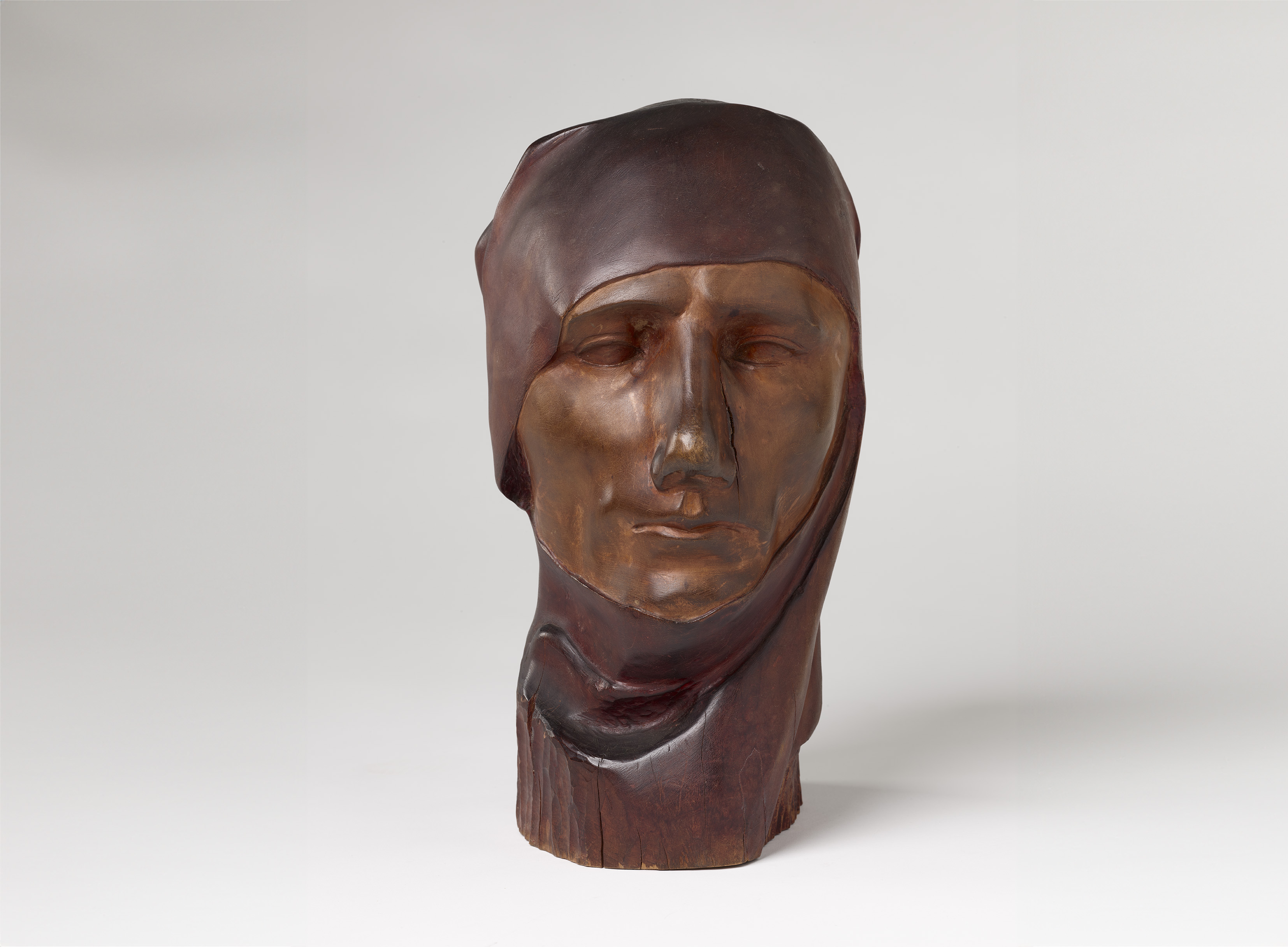Discontent, a wooden sculpture of a woman's head by Prophet