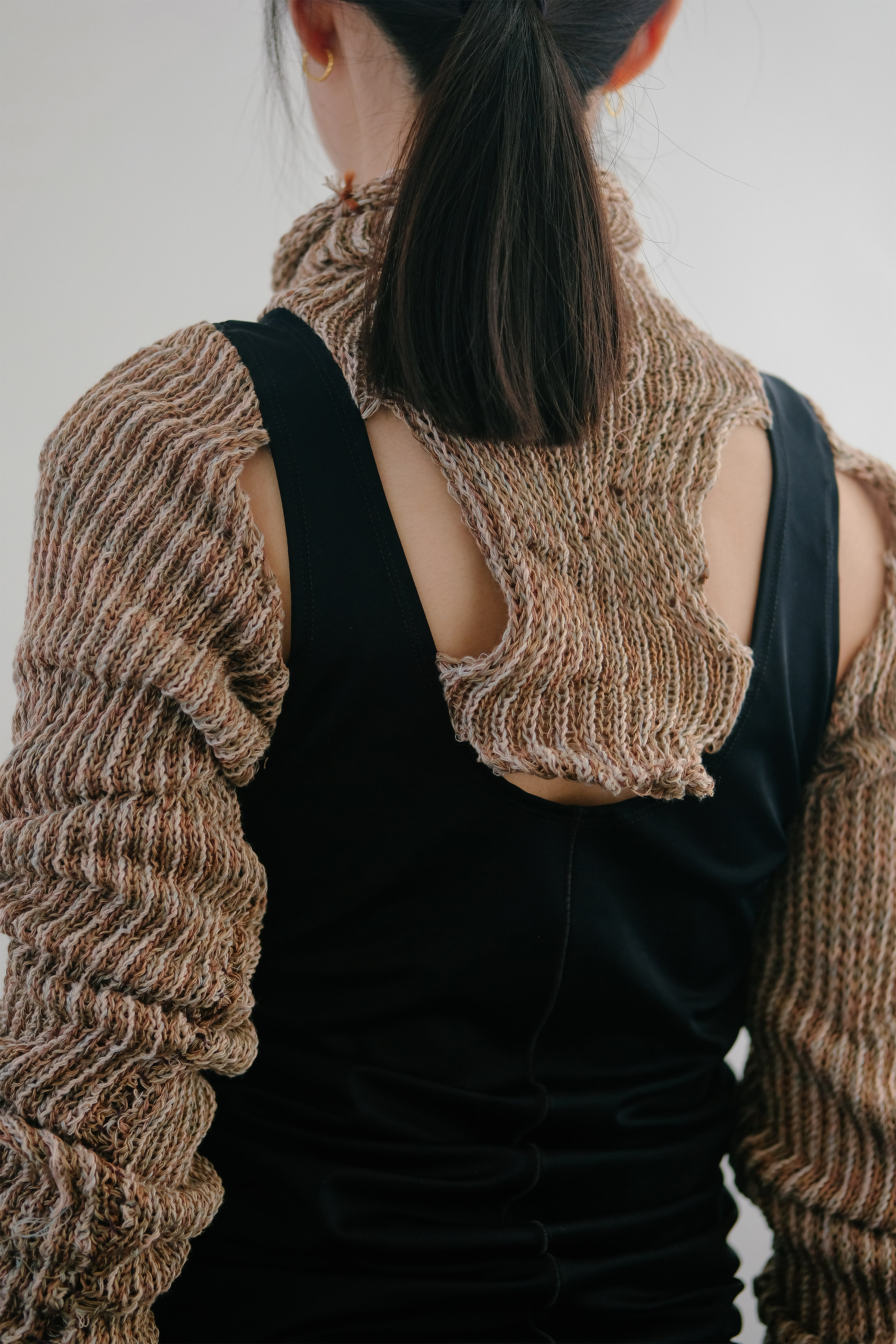 back detail of knitted garment