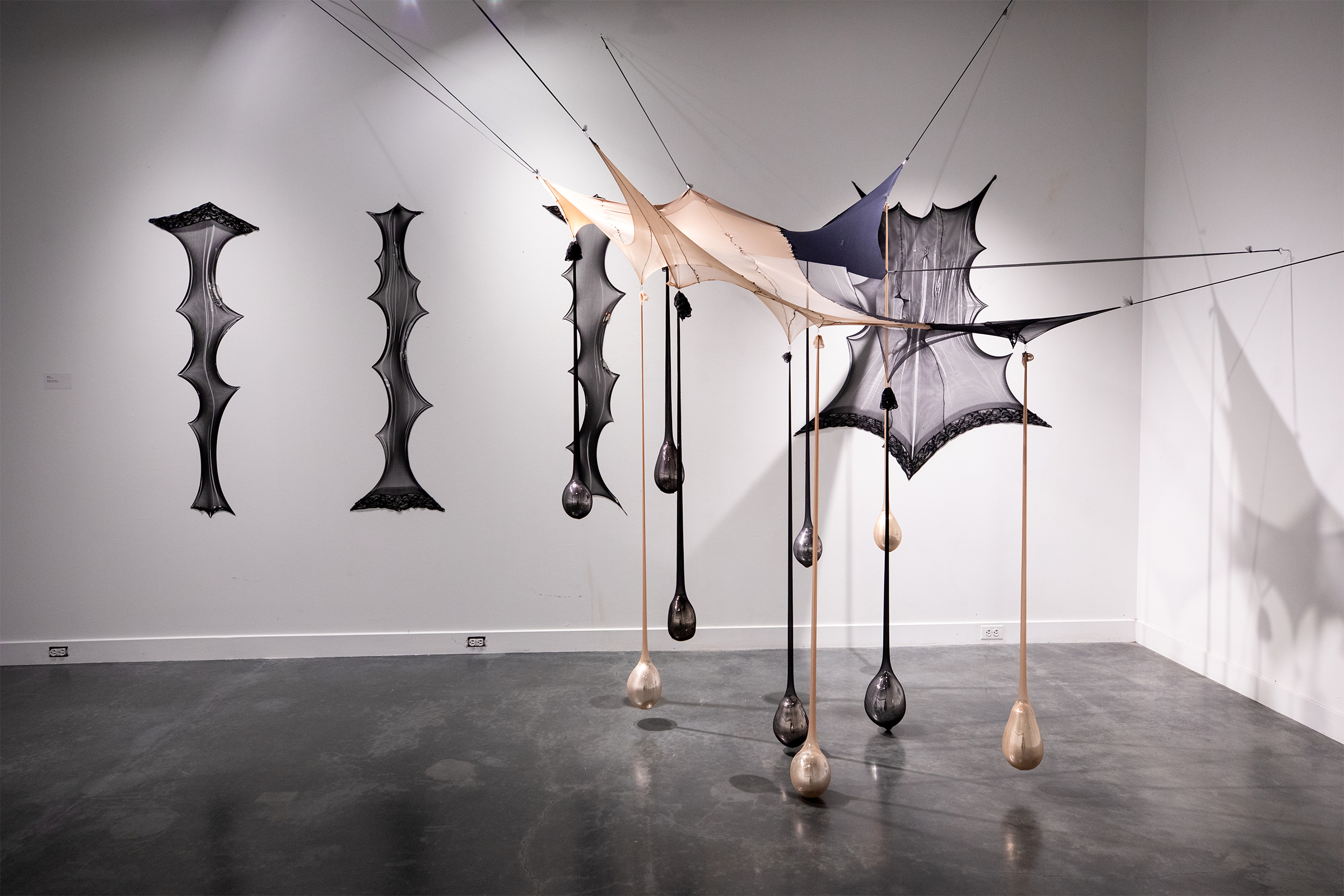 hanging installation featuring pantyhose