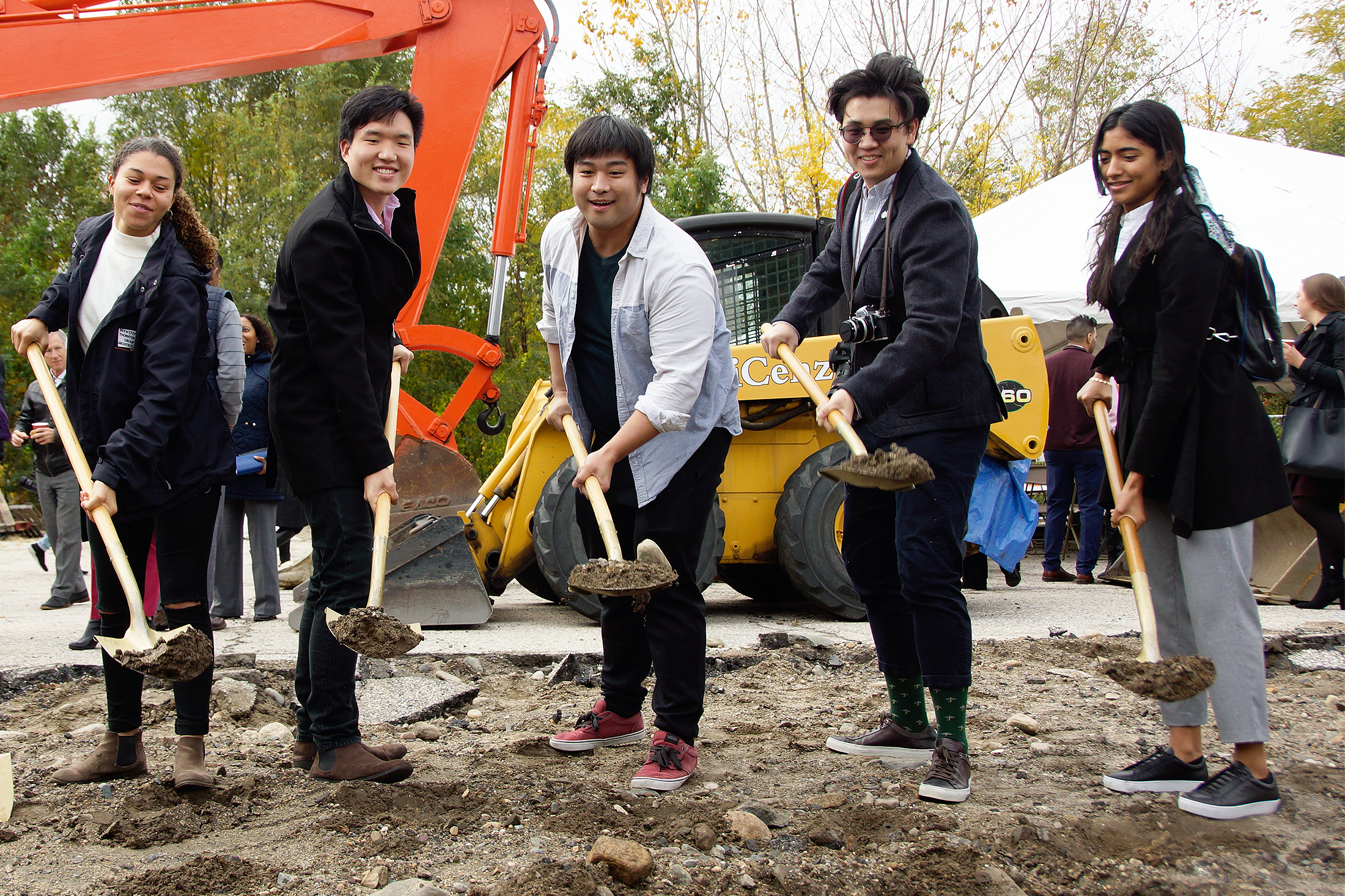 students pose with shovels at Providence small homes groundbreaking