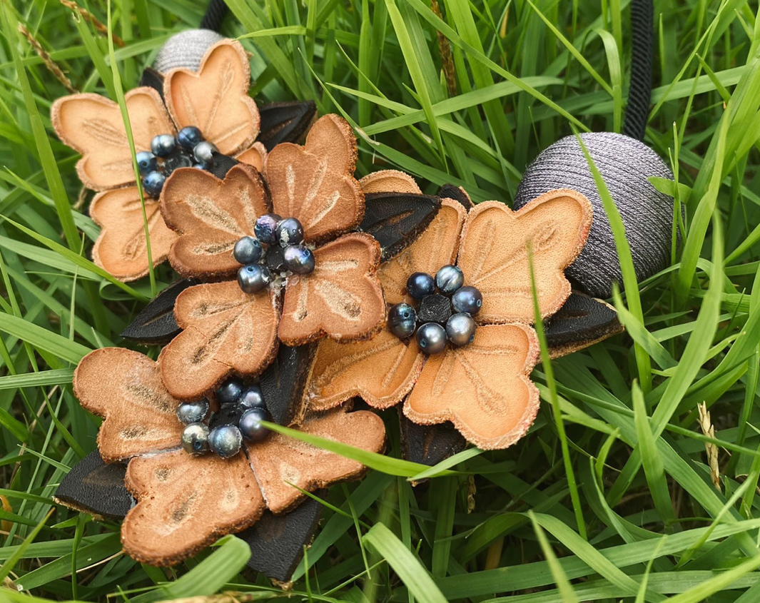 leather objects resembling flowers