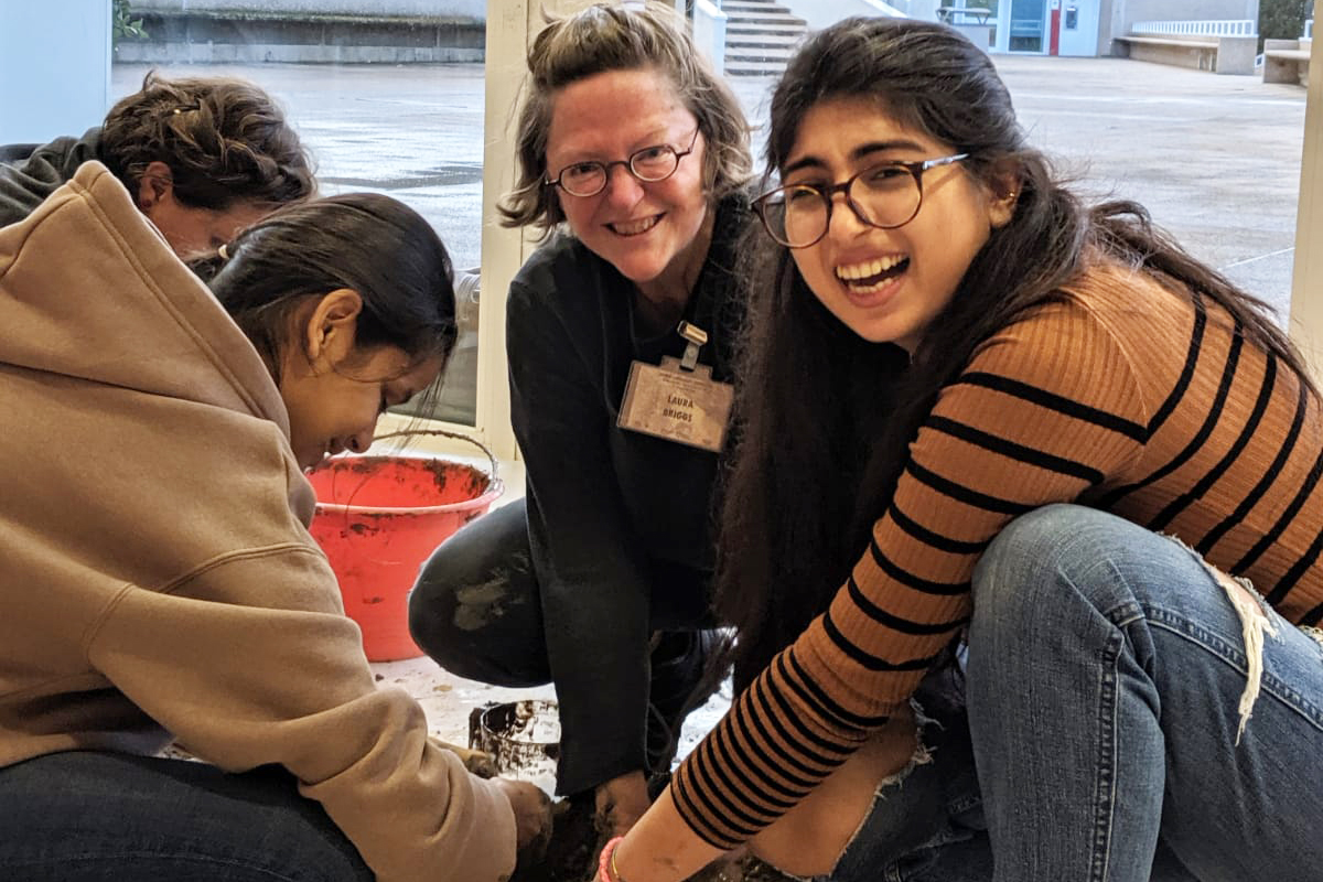 Laura Briggs works with students in Sardinia