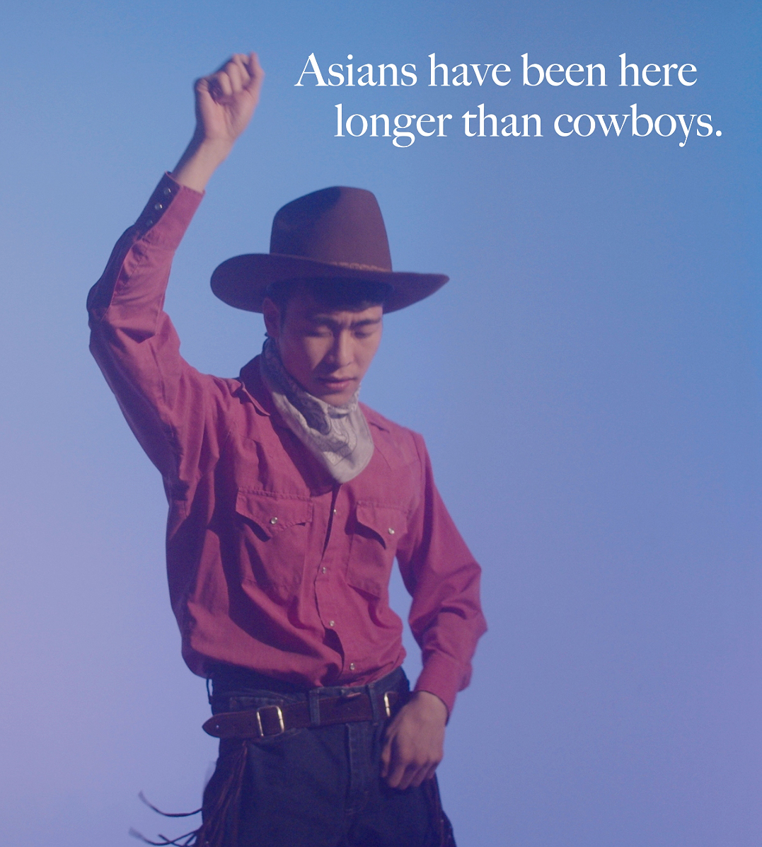 image of an Asian man posing as a cowboy