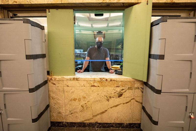 Media Resources office with plexiglass windows and other physical safety measures set up