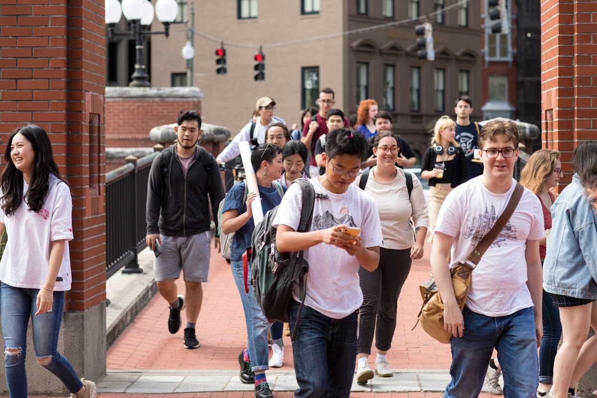 Students crossing bridge over canal near RISD campus