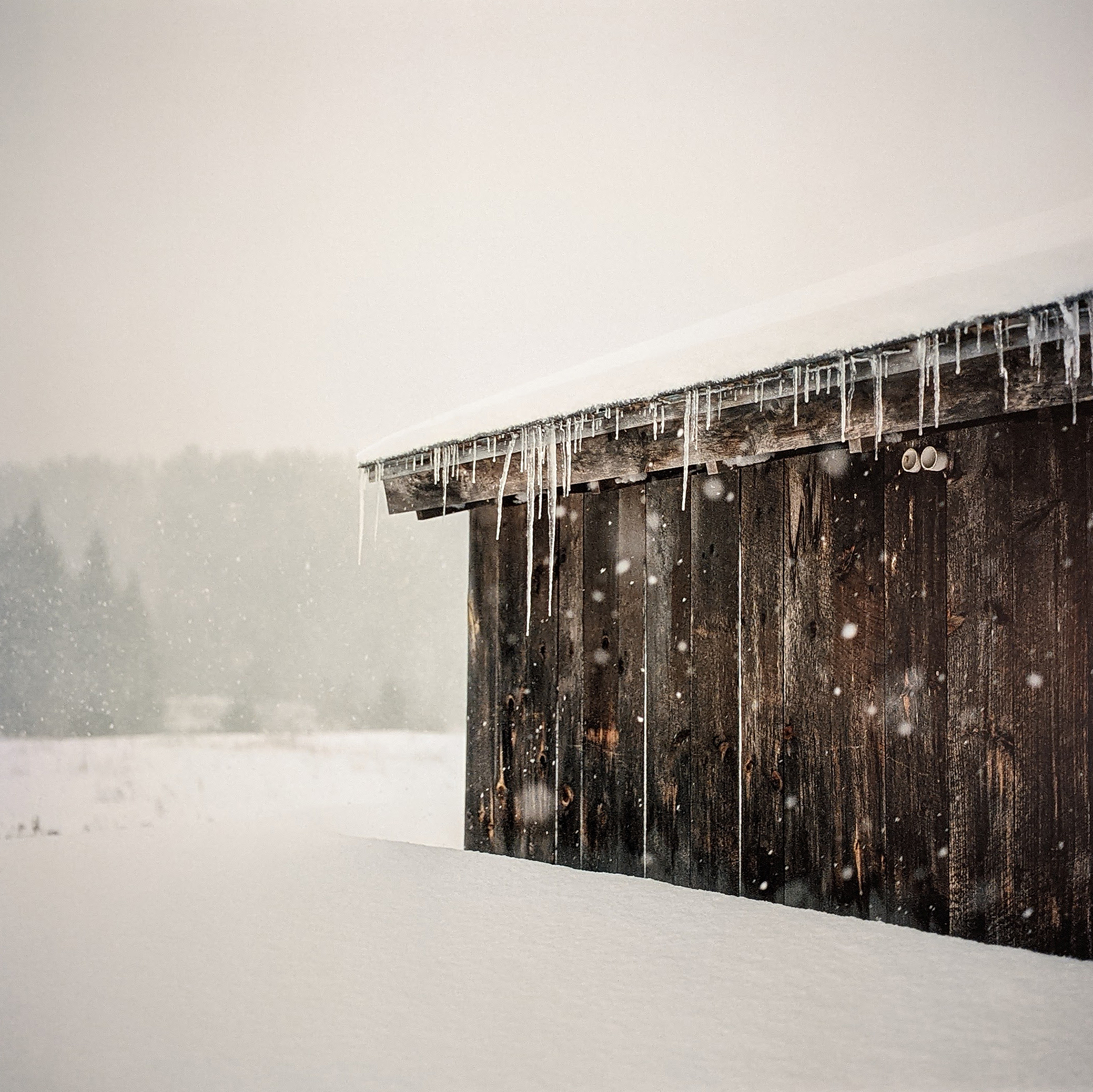 photograph of a barn in winter by Thad Russell