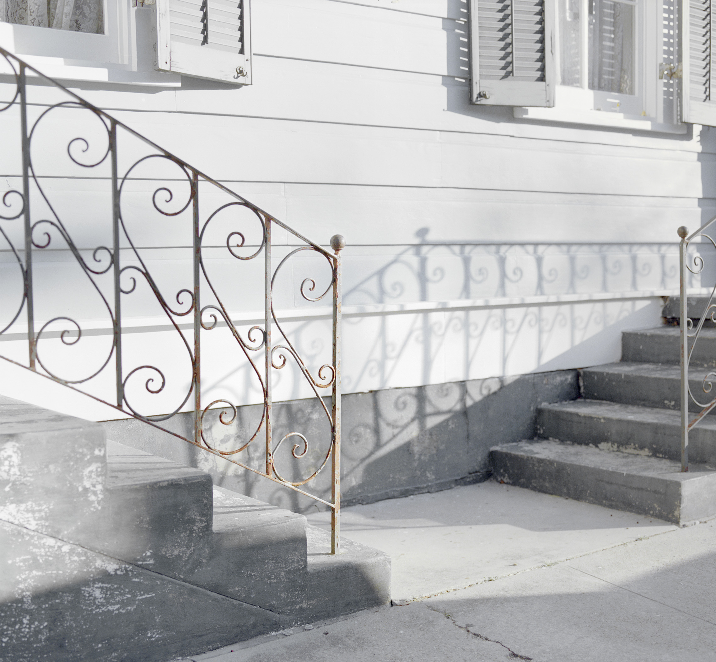 black-and-white photo of old-fashioned bannisters