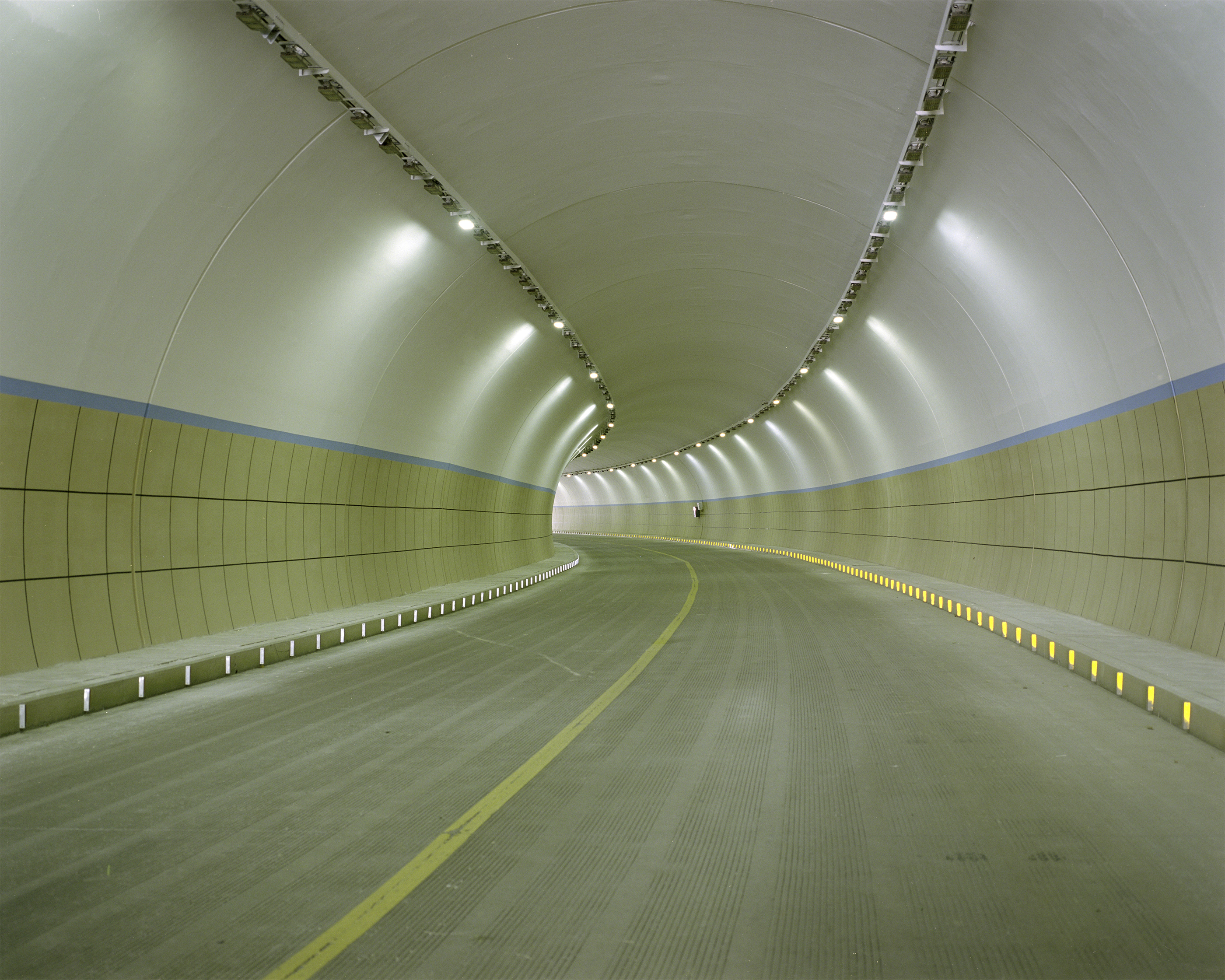 the curving interior of a traffic tunnel
